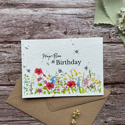 close up of personalised wildflower meadow plantable birthday card showing detailed wildflowers and bees