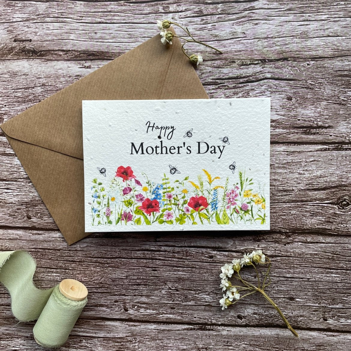 personalised seed paper mother's day card featuring wildflower meadow illustration and "Happy Mother’s Day" message alakartcreations