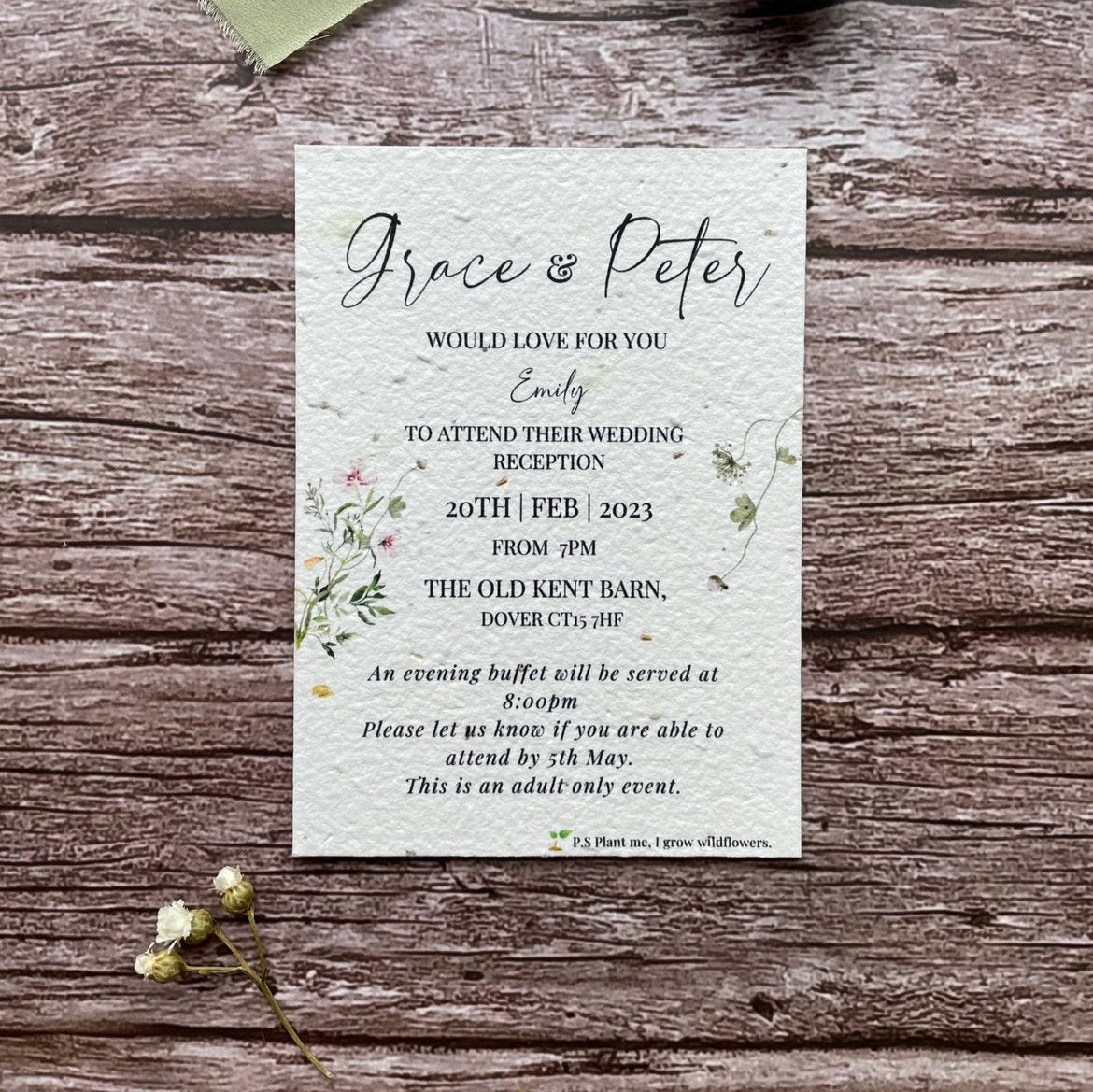 plantable evening guest wedding invitations in spring green theme, showing front view, floral design on wooden background, eco-friendly