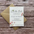 plantable seed paper wedding save the date cards in sweet pea theme, front view with eco-friendly brown kraft envelope, floral design on wooden background, alakartcreations