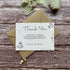plantable seed paper wedding thank you cards in lilac theme, front view with eco-friendly brown kraft envelope, floral design on wooden background, alakartcreations