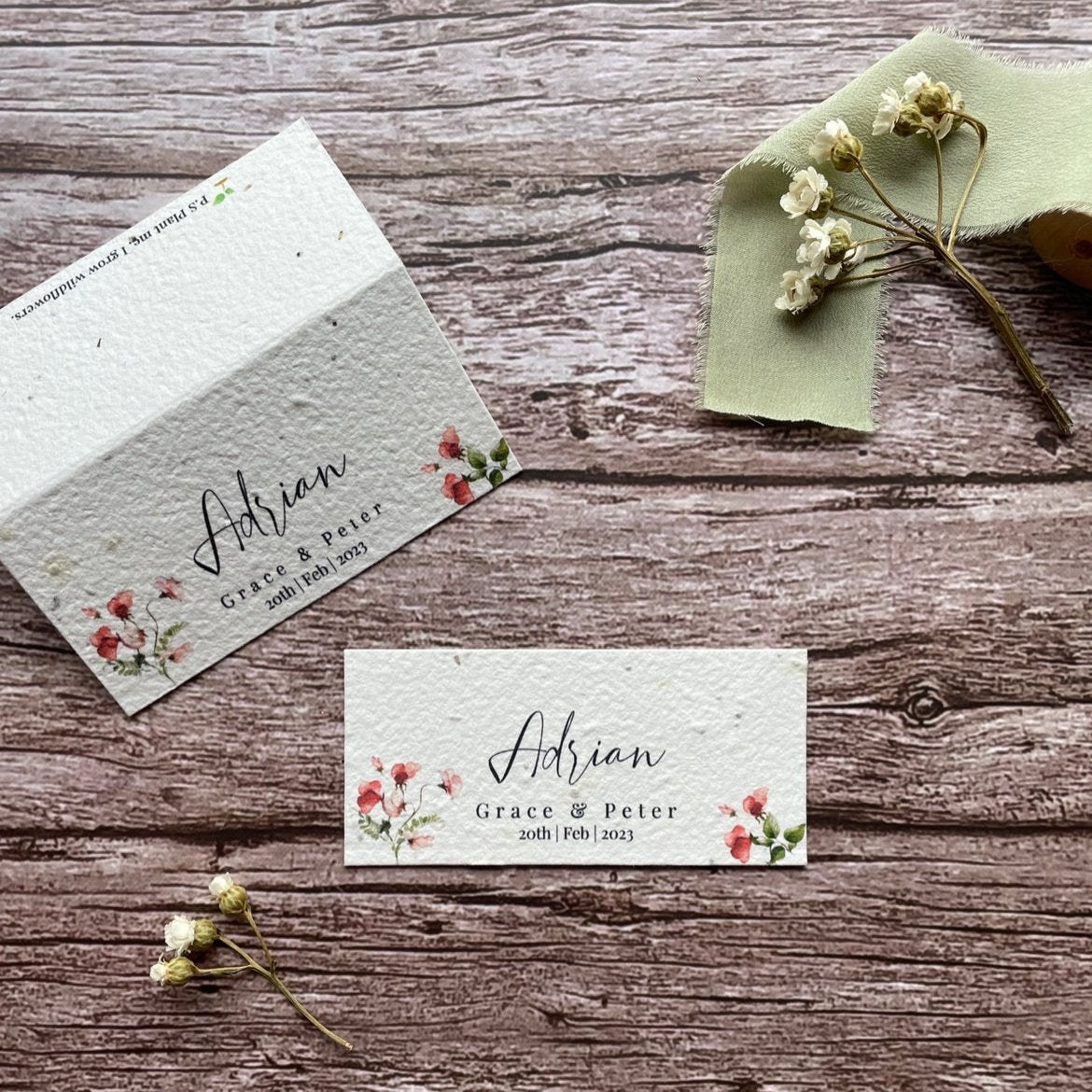 plantable wedding guest place card featuring sweet pea design, standing up to showcase eco-friendly seed paper, from a la kart creations